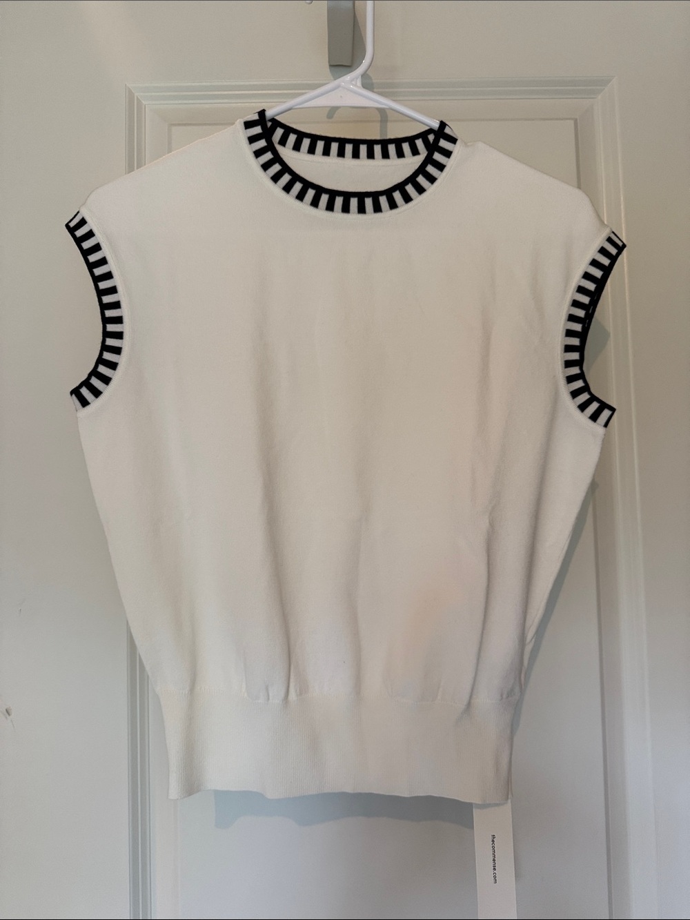 Women’s cream Knit Sleeveless Sweater with Black Trim